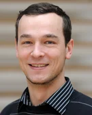 Porträtfoto von Dr. Eric Ehrke-Schulz 
