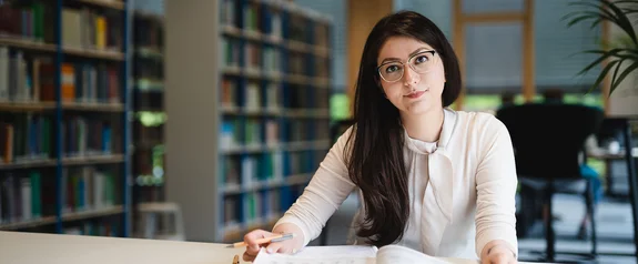 A Management Bachelor student studies in the library