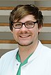 Porträtfoto von Dr. Peter Schmidt