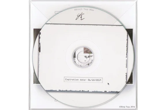 3 Years and 6 Months of Digital Decay, 2016-2019, CD-R (audio guide and offline index to the web-based artwork). Photo: ©Shinji Toya. View of a transparent CD cover.