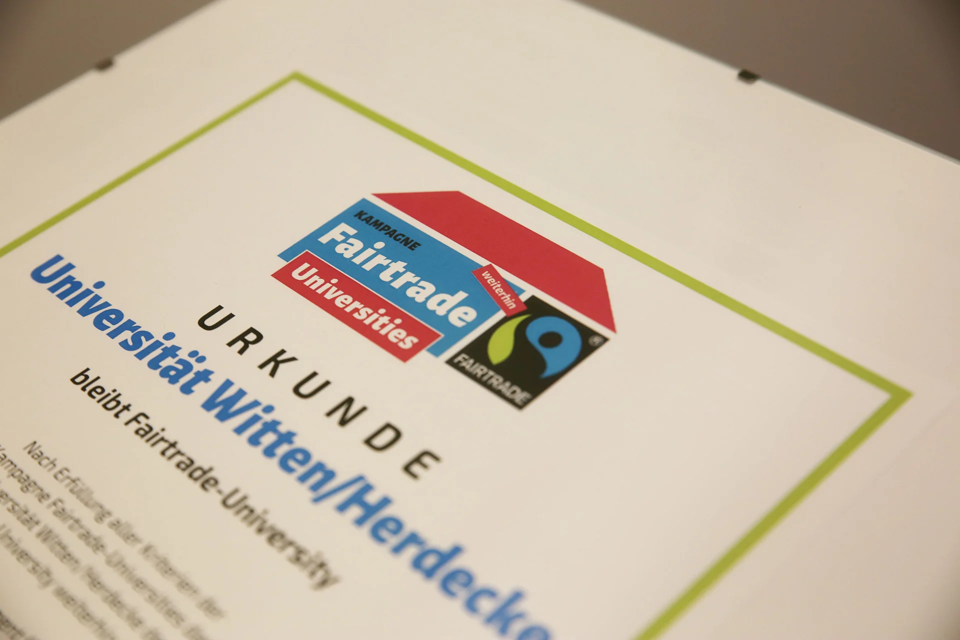 Photo of a certificate with the Fairtrade University logo.
