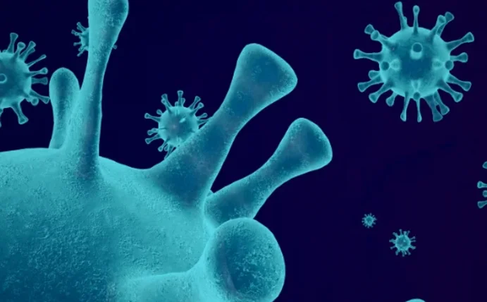 Bessere Versorgung für Menschen mit seltenen Erkrankungen (Foto: Canva) Eine mikroskopische Darstellung eines Virus in blau vor schwarzem Hintergrund.