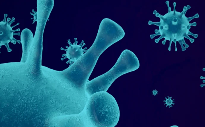 Better care for people with rare diseases (Photo: Canva) A microscopic image of a virus in blue against a black background.