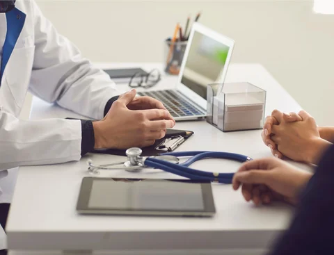 Patients visiting a doctor, motif as cut-out.