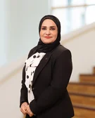 Portrait photograph of Amal Azez