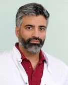 Porträtfoto von Dr. Sachin Chhatwani