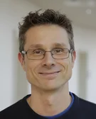 Porträtfoto von Dr. Christian Opländer