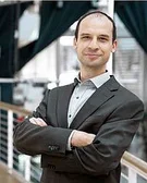 Porträtfoto von Dr. Tobias Köllner