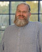 Porträtfoto von Dr. Stefan Huggenberger