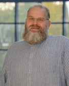 Porträtfoto von Dr. Stefan Huggenberger