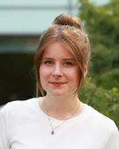 Porträtfoto von Dr. Sina Schumacher