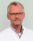 Porträtfoto von Dr. Andreas Vahlenkamp