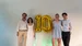Organizing team for the Witten Prize for Health Visionaries (from left: Wilhelm Ruppert, Isabella Vogler, Lupita Kruse, Kerim Arslan) (Photo: David Endres) Two female students and two male students are standing in front of a wall, with a balloon shaped like the number 10 in the middle.