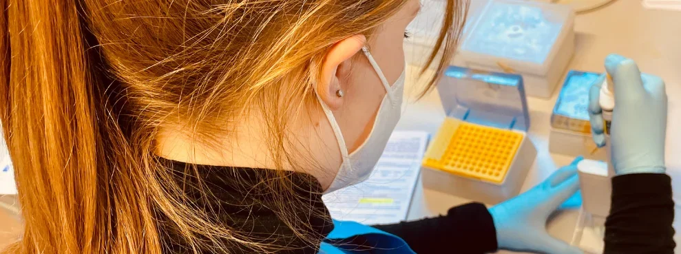 A scientist carries out tests in the laboratory.