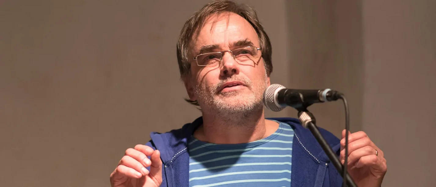 Portrait of a man at the lectern